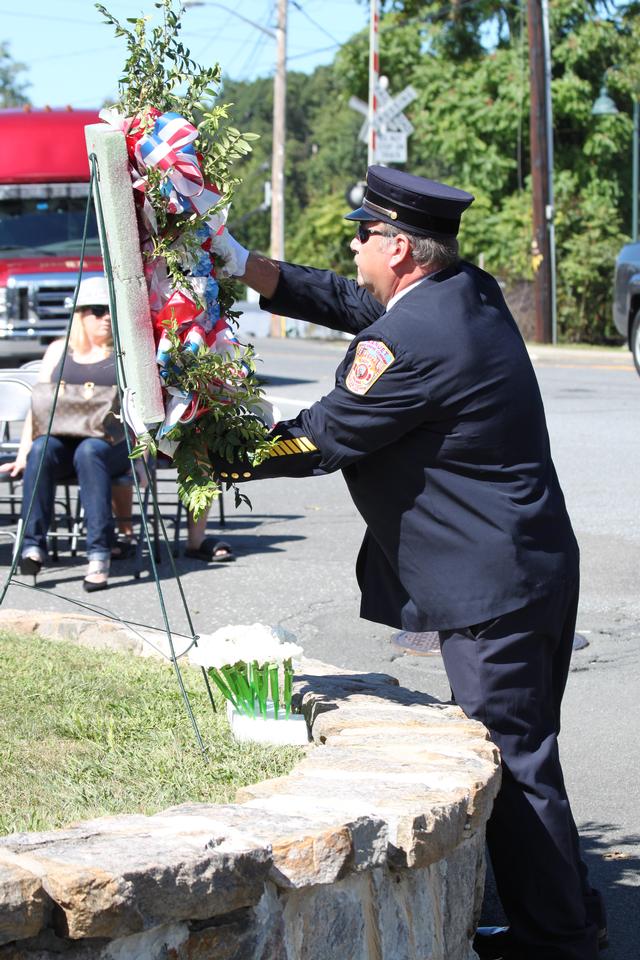 Flower placed for members from 1920 to 2012 by Harold Straut.

Memorial Service NFD. September 9, 2012. Photo by Vincent P. Tuzzolino